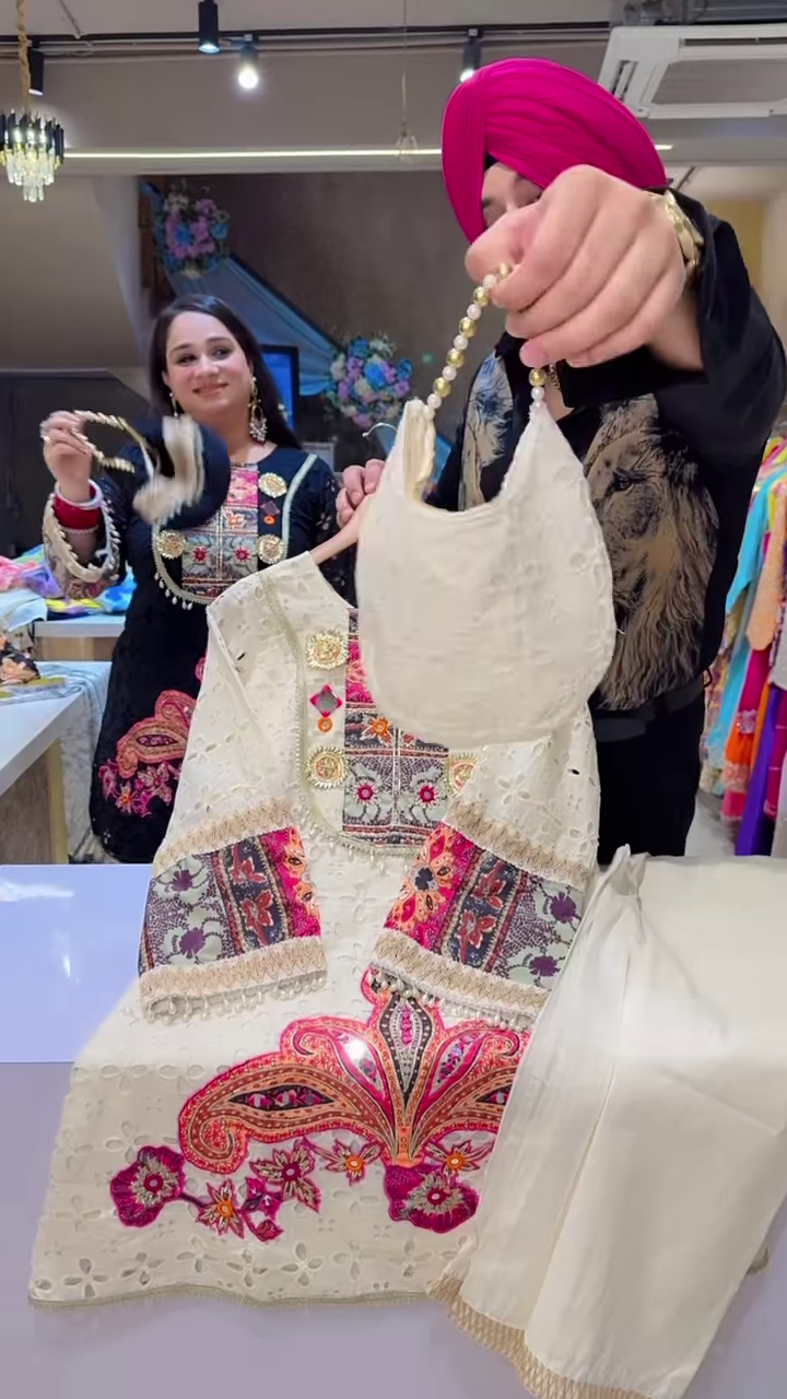 Black Embroidered Ethnic Dress with Multicolor Floral and Geometric Patterns, Tassel Accents - Image 3