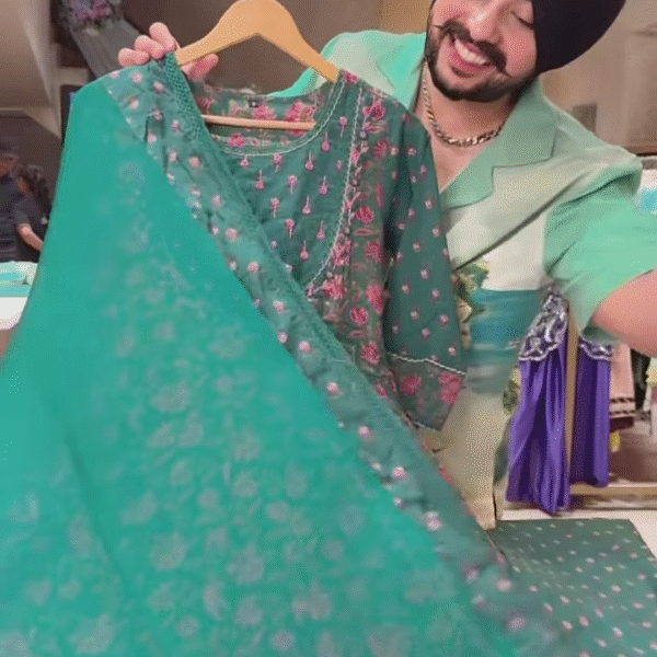 Green Floral Printed Ethnic Dress with Embroidered Neckline and Coordinated Fabric Panel