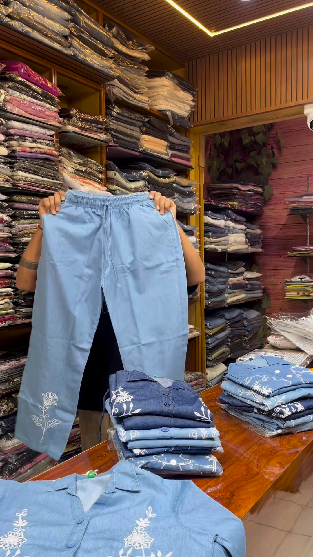 Light Blue Long-Sleeve Shirt with White Floral Embroidery and Button-Front Closure - Image 6