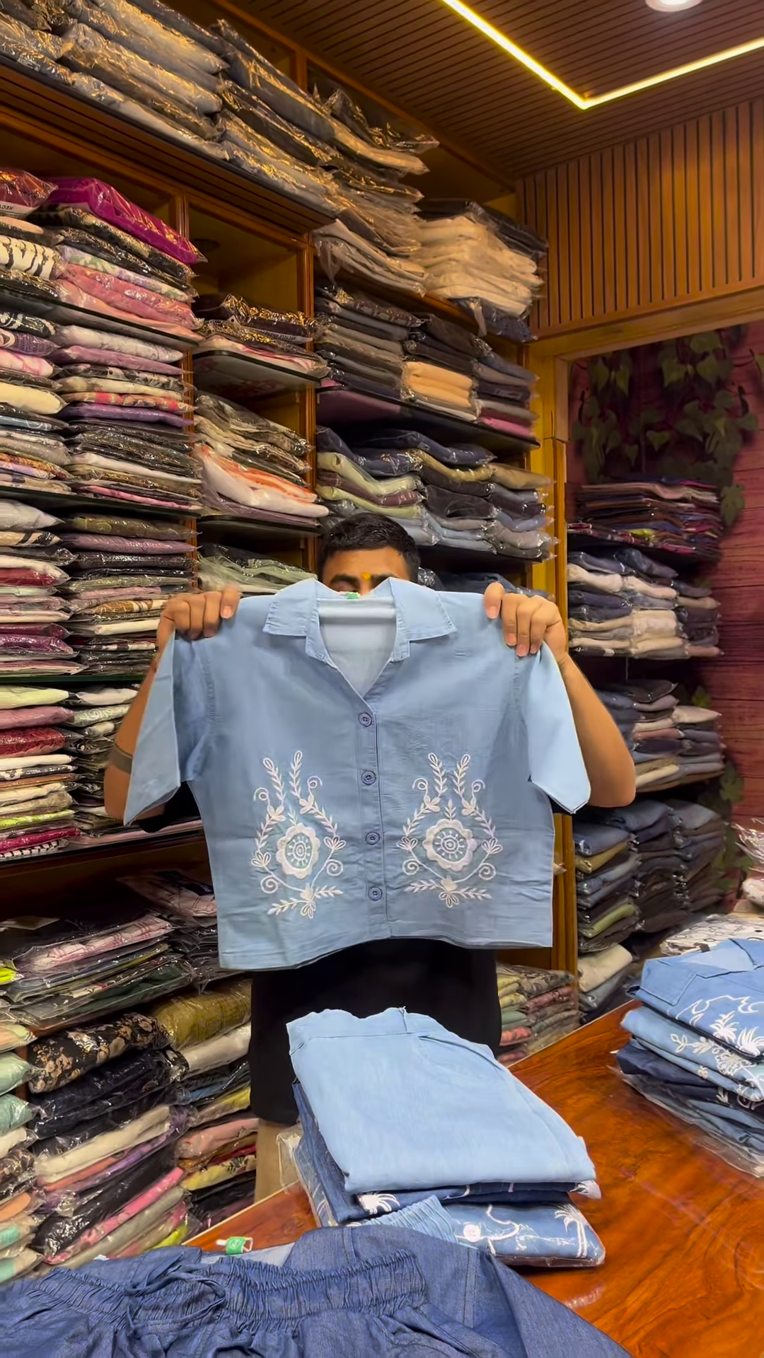 Light Blue Long-Sleeve Shirt with White Floral Embroidery and Button-Front Closure - Image 3