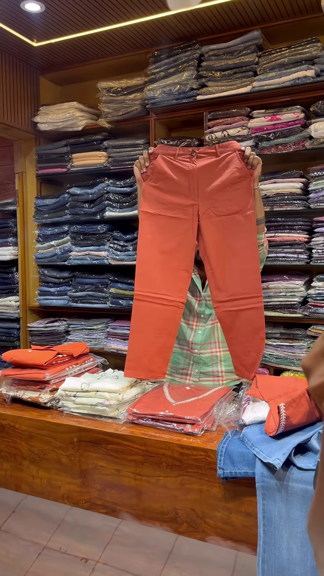 Orange Sleeveless V-Neck Vest with White Embroidered Edges and Button Closure - Image 4