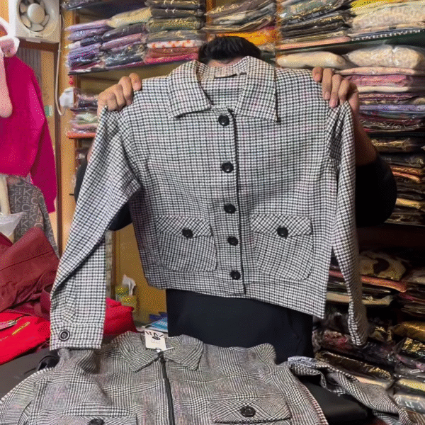 Black and White Checkered Long-Sleeve Jacket with Front Flap Pockets and Button Closure