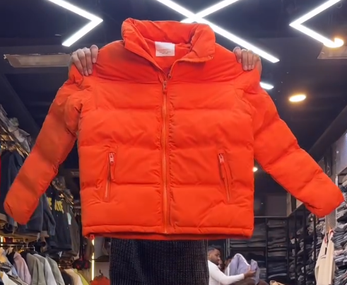 🧡❄️ Stay Warm in Style – Vibrant Orange Puffer Jacket