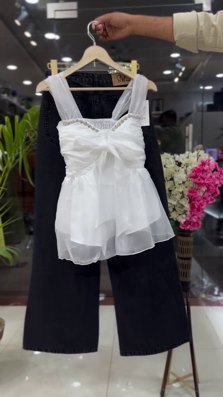 β¨ Elegant & Chic: White Sleeveless Organza Ruffled Top with Embellished Neckline & Dark Trousers π