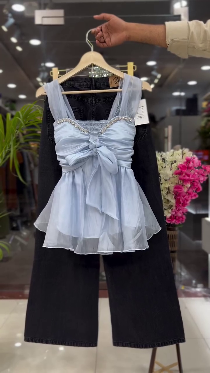 β¨ Elegant & Chic: White Sleeveless Organza Ruffled Top with Embellished Neckline & Dark Trousers π - Image 2