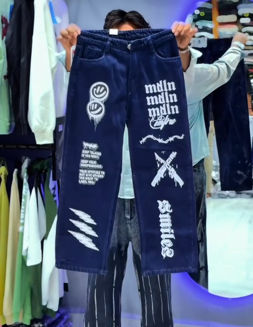 π Make a Bold Statement with Light-Wash Graphic Jeans π - Image 3