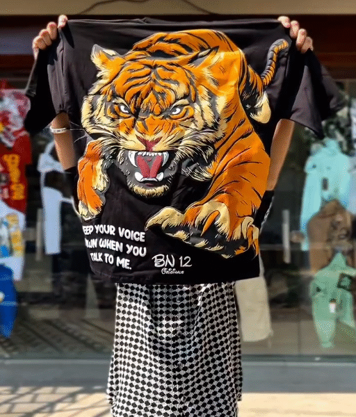 Roar in Style: Black Oversized T-Shirt with Bold Tiger Graphic Print 🖤🔥