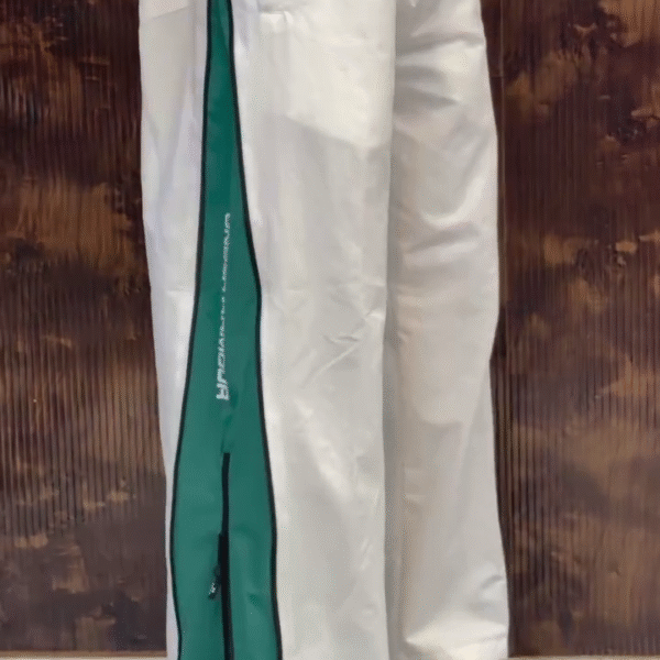⚪ White Under Armour Track Pants with Green Side Stripe – Sporty Performance Fit with Modern Streetwear Edge 🟢