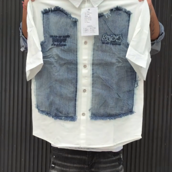 “Classic Meets Edge: White Button-Down Shirt with Denim Patchwork Detail” 👔💙