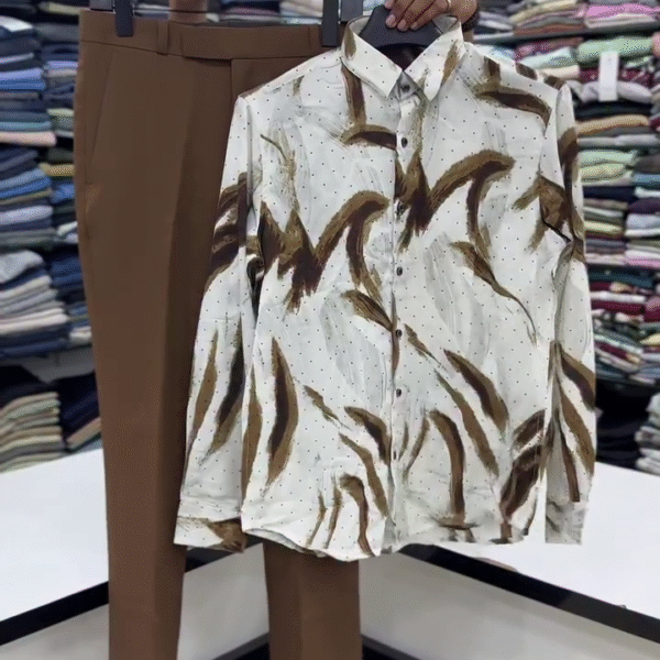 “Modern Sophistication: White Abstract Print Shirt with Brown Trousers” 🤍🤎👔