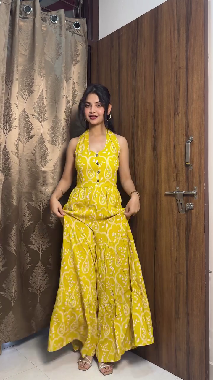 Radiate Sunshine Elegance in This Stunning Printed Halter Maxi Dress